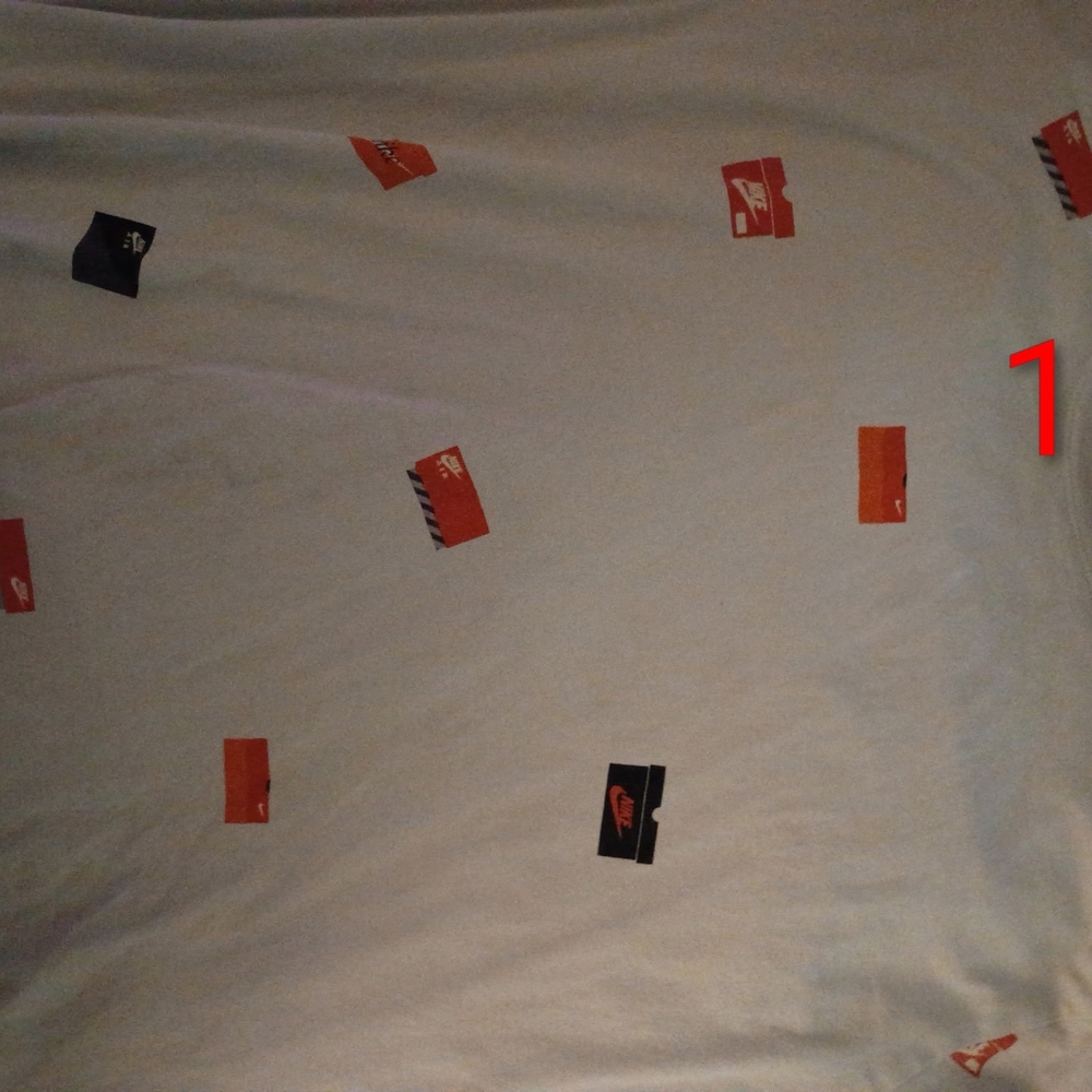 Nike White Tee with Orange and Black Details